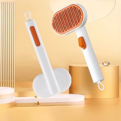 acheter Pet Dog Brush Dépilateur Outils de toilettage Pour chat Un bouton de peigne de nettoyage automatique fabrication en ligne